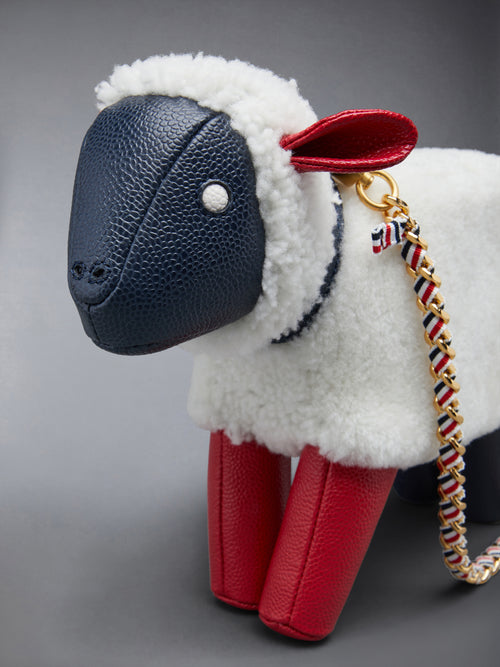 SMALL SHEEP CHAIN BAG IN SHEARLING & PEBBLE GRAIN