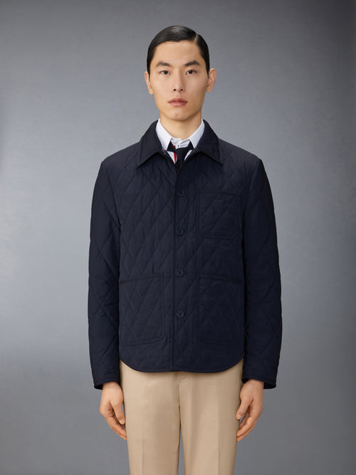 POLY TWILL QUILTED APPLIED POCKETS AND SELF TIPPING SHIRT JACKET