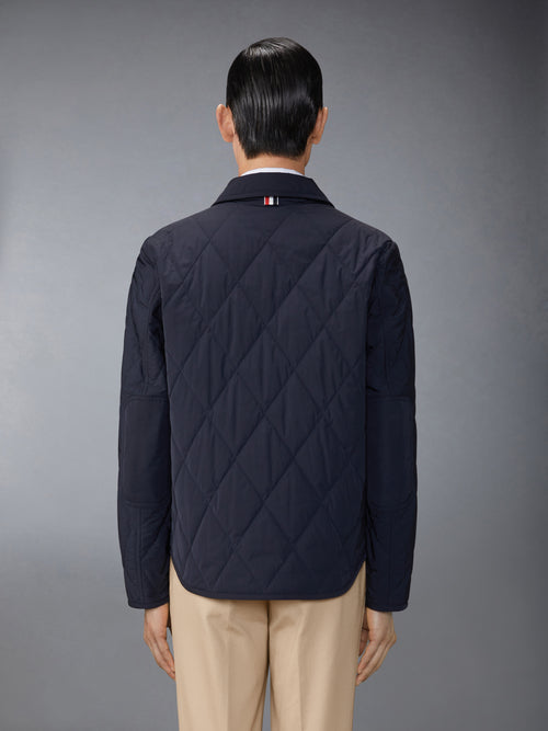 POLY TWILL QUILTED APPLIED POCKETS AND SELF TIPPING SHIRT JACKET