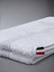 4-BAR FRETTE QUILTED BATH MAT - WHITE